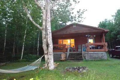 Image de Eberhards log cottage1, right on the Lake, private, scenic, gorgeous beach