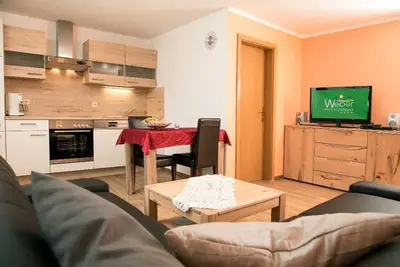 Image de Appartement dans une ambiance familiale avec aire de jeux pour enfants