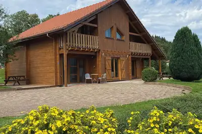 Image de Spacieux et charmant chalet, 6 minutes de Gerardmer, jacuzzi en option