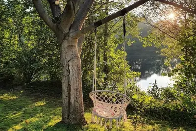 Image de Idyllic house with 85 sqm of living space right on the lake with optional hot tub