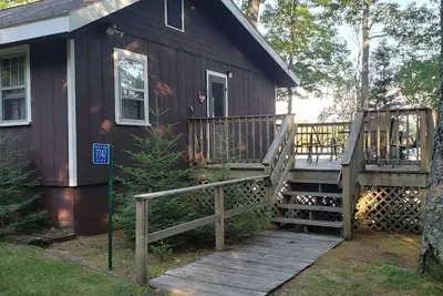 Image de Delightful lakeside cottage on Little Saint Germain with private dock and sandy