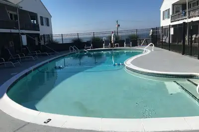 Image de 3 Br, 2 1/2 Ba. Across from beach. Heated outdoor pool (pool closes Labor Day)