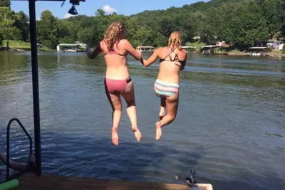 Image de Lakefront home with covered boat dock