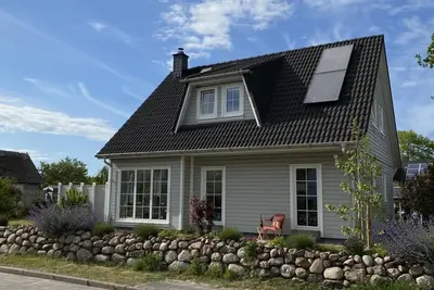 Image de Hus Hygge - garden, terrace, barbecue, Wlan, fireplace, sauna, close to the Bodden