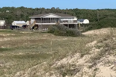 Image de Book Now! Dog friendly, partial Ocean View, 4x4 Area, Cozy Beach cottage.