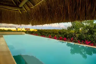 Image de This comfortable room is a great option for a romantic escape in Tulum.