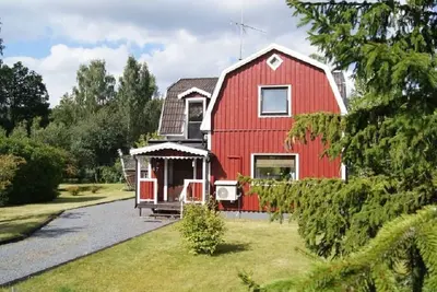 Image de Cozy holiday home with a 2500 square meter garden right on the lake