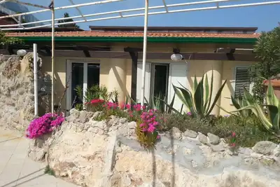 Property is located by the sea with its own private beach.