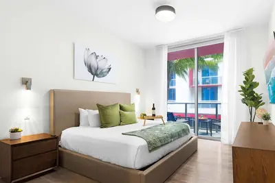 Image de Tropical Oasis |Rooftop Pool+ Near Beach+ Gym