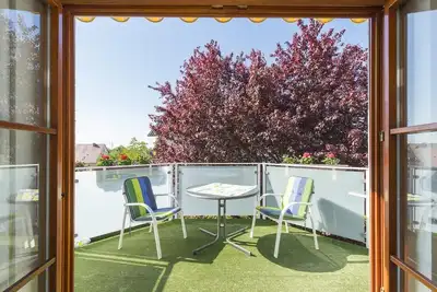 Appartement de vacances confortable à Baur avec balcon orienté vers le sud et Wi-Fi.
