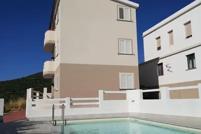 Image de Three-room sea-view apartment with pool in Badesi