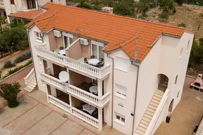 Image de Charming new apartment, 70 m to the beach, 8 people, WiFi, parking, terrace, Bbq