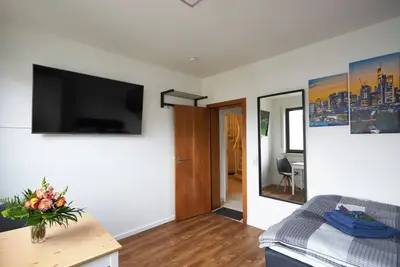 Studio d'affaires dans une pension moderne - transports en commun - location gratuite de vélos