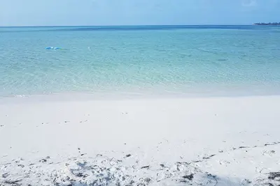 100ft from the most beautiful beach and crystal clear water, with free golf cart