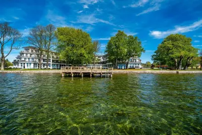 Image de Mueritzpalais GmbH - Apartment Müritz with side view of the Müritz