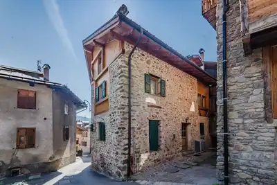 Image de Appartement \"Appartamento Peio\" avec vue sur montagne, cheminée et Tv