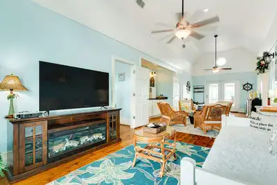 Image de Bay and gulf-view home with gas grill, deck, and outdoor seating area