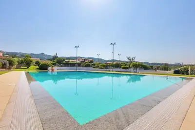 Image de Villetta Amelie a Baja Sardinia avec A/C, Jardin, Terrasses & Piscine partagée