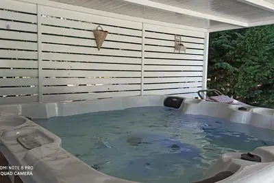 Image de The Pine Lodge With Jacuzzi
