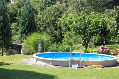 Image de 2-room house with private garden and pool in shared use