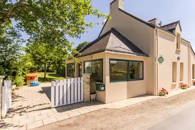 Image de Gîte familial près de Guérande avec jardin, terrasse, jeux pour enfants, et coin détente