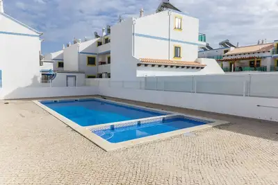 Image de Villa avec Wifi, piscine partagée à 200m de la plage by AlgarveManta (1v4)