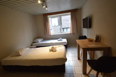 Image de Room in Apartment - Condo Gardens Leuven - Budget Studio Twin
