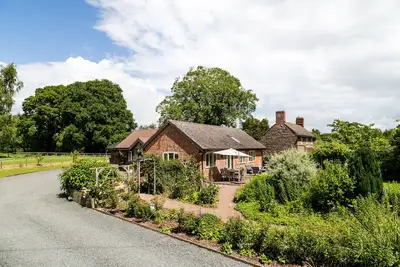 Image de The Cider Mill  3 ensuite bedrooms  Superking beds  Great for groups or families