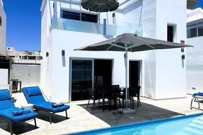 Modern detached villa with private heated pool in the heart of Puerto Del Carmen