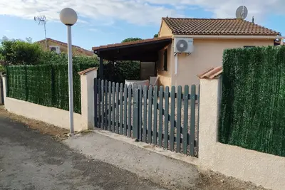 Image de Pavillon de vacances dans résidence privée avec piscine