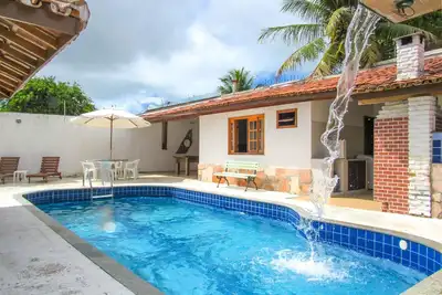 Image de Casa com 4 Suítes, Piscina, Área Gourmet e Wifi
