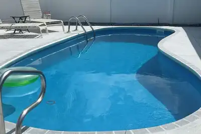 Image de 3 bed 2 bath, 1500 sf, ct yard villa, private heated pool and 4 person golf cart