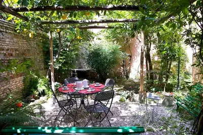 Image de Côté Jardin : ravissant 1 pièce avec jardin privé dans le quartier historique du Trastevere