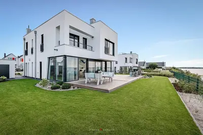 Image de Villa Seemööv - 1st row water, terrace, whirlpool, sauna, fireplace, e-charging station