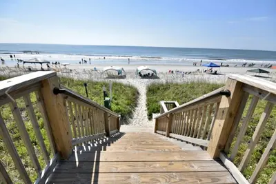 Luxury condo with wraparound balcony overlooking the ocean