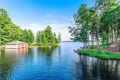 Image de Dog-friendly, lakefront getaway w/ a wraparound balcony, beach, & boat access