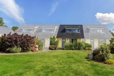 Image de Maison de vacances Neuenkirchen pour 1 - 5 personnes avec 2 chambres à coucher - Maison mitoyenne