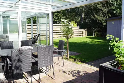 Image de North Sea coast, charming house with fireplace, winter garden, beach chair, new: sauna