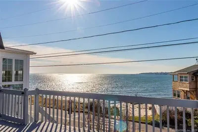 Image de Sleep to the sound of the waves. Watch the sun set from the deck! Secluded beach