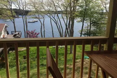 Image de Bord de l'eau 8 chambres pour 20 personnes avec un quai privé