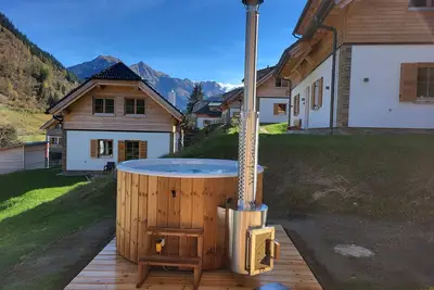 Image de Chalet avec sauna, bain Ă remous et lounge set