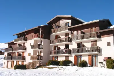 Image de À 10m des pistes de ski, 3ème étage, balcon, télévision, casier à ski, 17m², La Toussuire