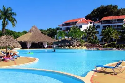 Image de Inexpensive Condo in tropical resort, pool\/cable Tv\/Wifi, fully equipped