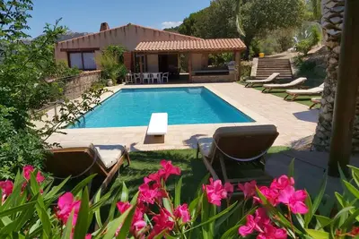 Image de Ascopa, maison tout confort, piscine chauffée, superbe vue mer et climatisation