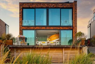 Image de \"Strandvilla Auf der Ostsee\" luxury vacation home with exclusive design and sauna