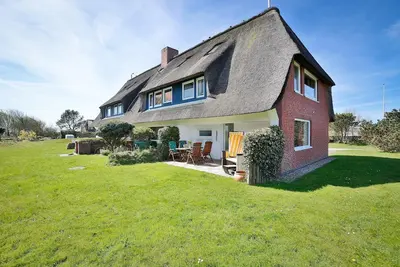 Image de L'appartement est situé dans un appartement maison au toit de chaume 8-partie