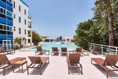 Image de 3bd luxury condo on sandy beach, with pool\/elevator\/Bbq\/Ac\/Wi-Fi\/Cable Tv