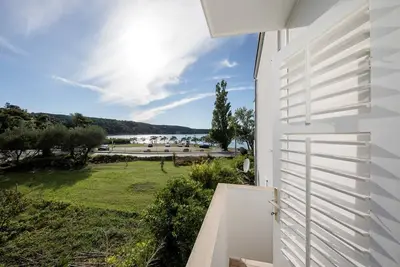 Image de Apartment Stanicic A2 with Balcony and Sea View