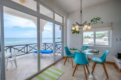 Beautiful upscale condo with Caribbean view! Ac, WiFi and pool!
