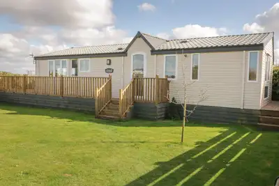 Image de Coed Llai Lodge, pet friendly, with a garden in Trearddur Bay